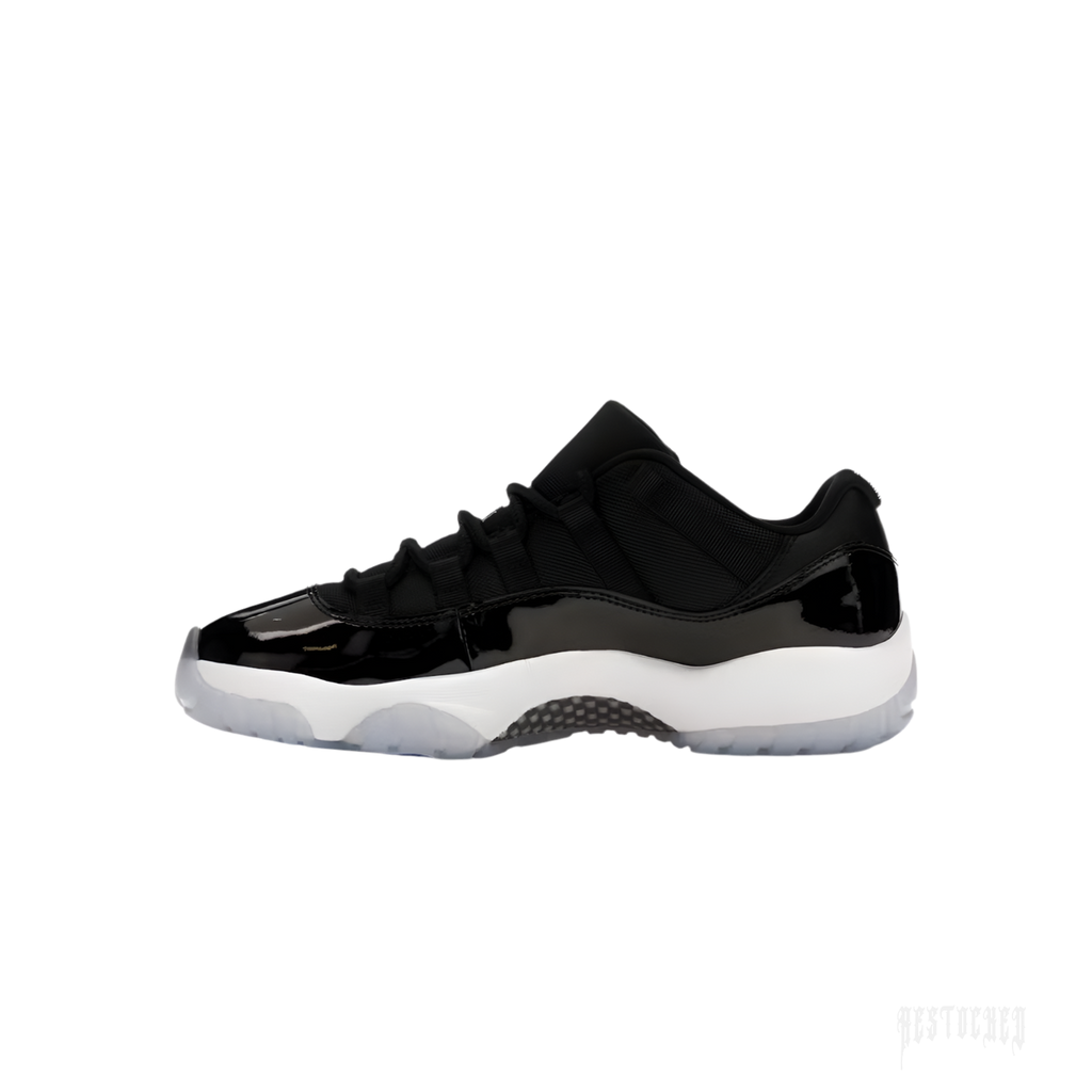 Jordan 11 Retro Low Space Jam sneaker, black patent leather and mesh upper, white midsole, icy blue outsole.