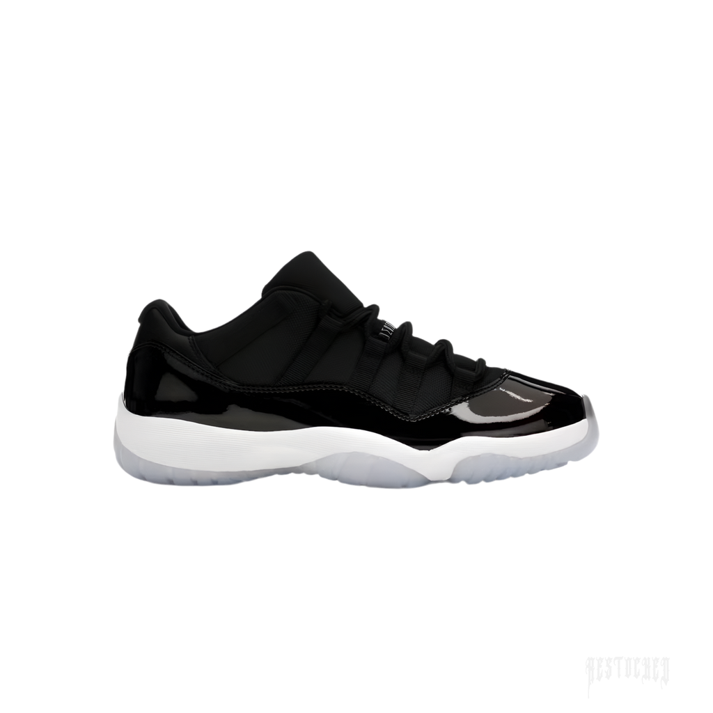 JORDAN 11 RETRO LOW SPACE JAM sneaker, black patent leather and mesh upper, white midsole, icy translucent outsole.