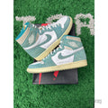 Pre-owned Jordan 1 Retro High Turbo Green sneakers, size 10, with white leather and teal suede, on a black box.