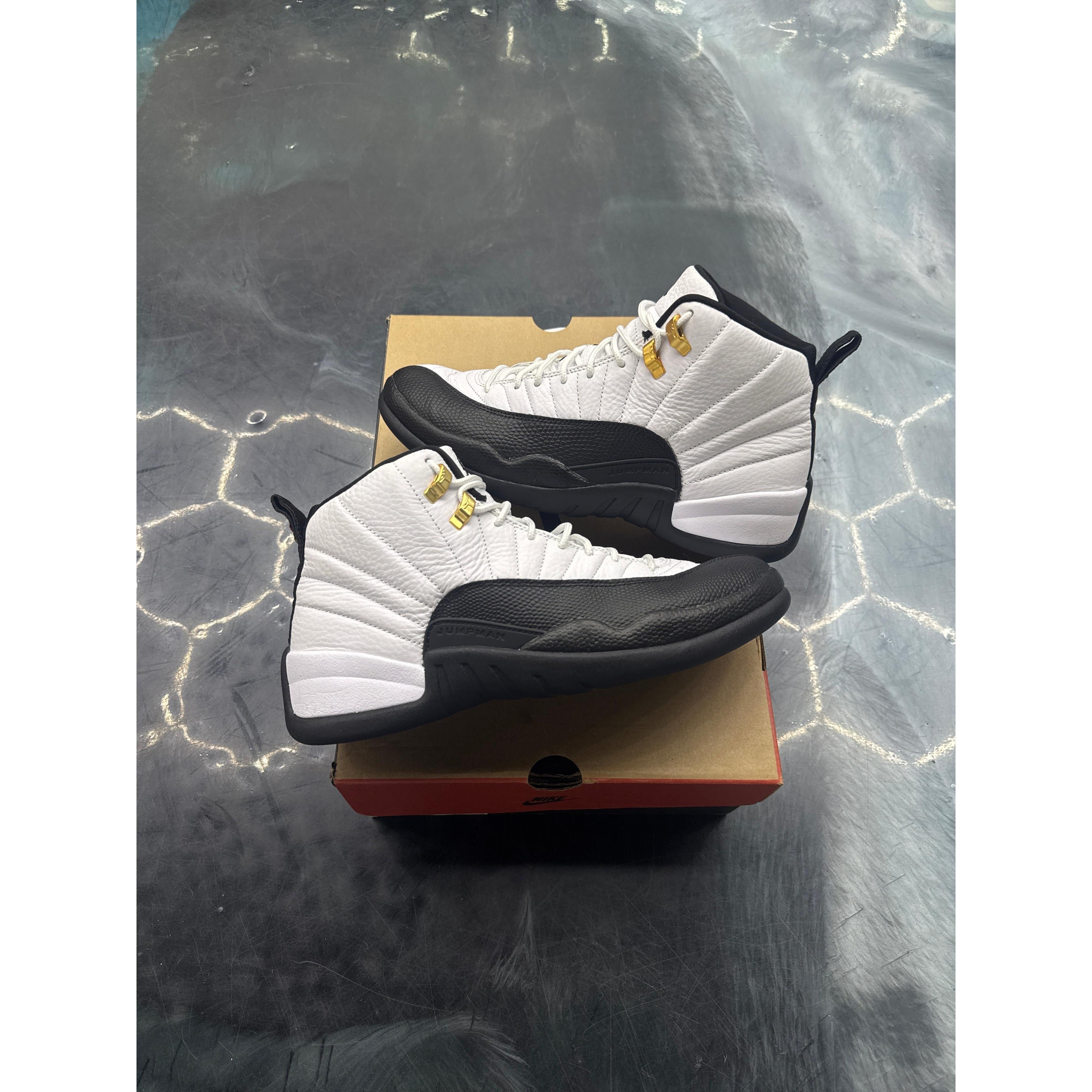 JORDAN 12 RETRO TAXI PRE OWNED SIZE 9.5