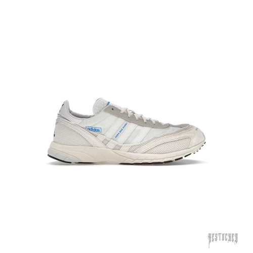 Adidas Adizero SL 72 Bad Bunny Off White sneaker, light cream mesh and suede, blue accents.