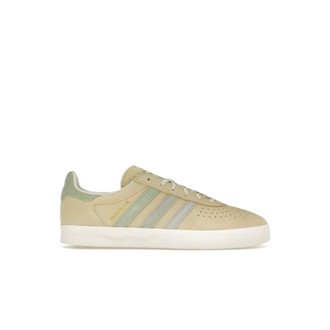 ADIDAS AS350 KITH CLASSICS Arctic Fusion sneaker, beige suede with light green stripes and heel tab.