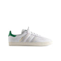 Adidas AS350 Kith Classics white leather sneaker with green heel tab and cream sole.