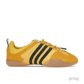 ADIDAS BALLERINA BAD BUNNY BOLD GOLD sneaker, yellow suede and textile upper with black stripes, gum sole.