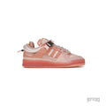 Bad Bunny x Adidas Forum Low "Easter Egg" sneaker in various shades of pink suede and leather with a buckle strap.