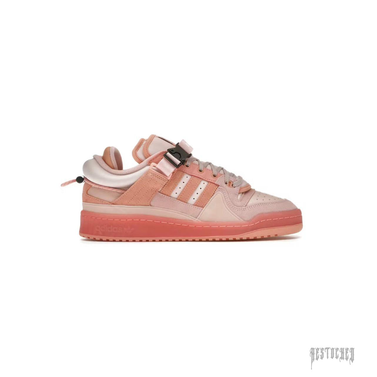 Bad Bunny x Adidas Forum Low "Easter Egg" sneaker in various shades of pink suede and leather with a buckle strap.