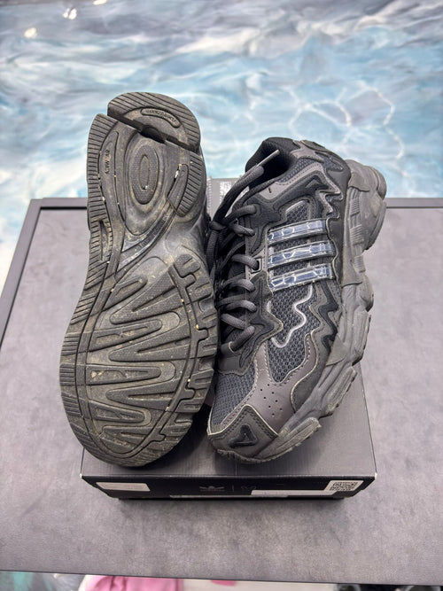 Pre-owned Adidas Response CL Bad Bunny Triple Black size 7 sneakers, showing textured soles and mesh/leather upper.