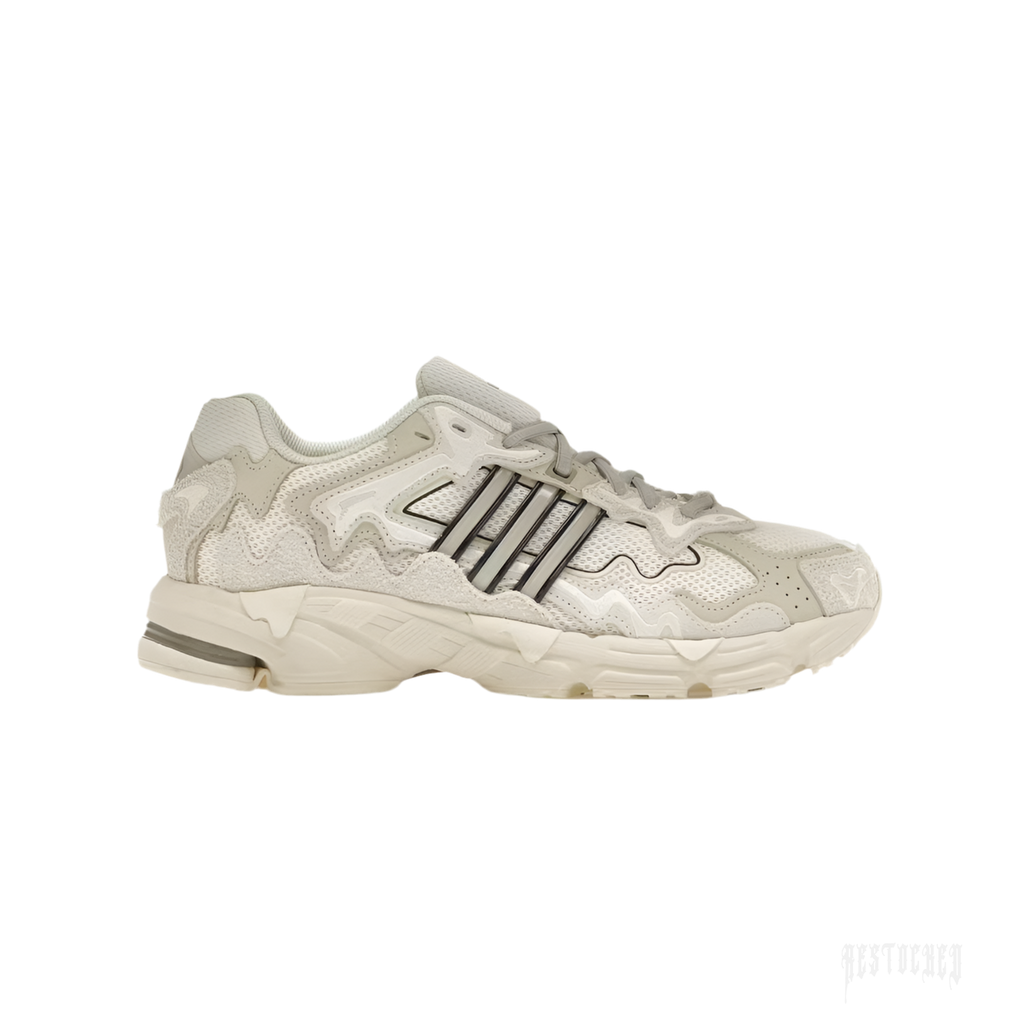 Adidas Response CL Bad Bunny "Wonder White" sneaker, light beige and off-white with dark gray stripes.