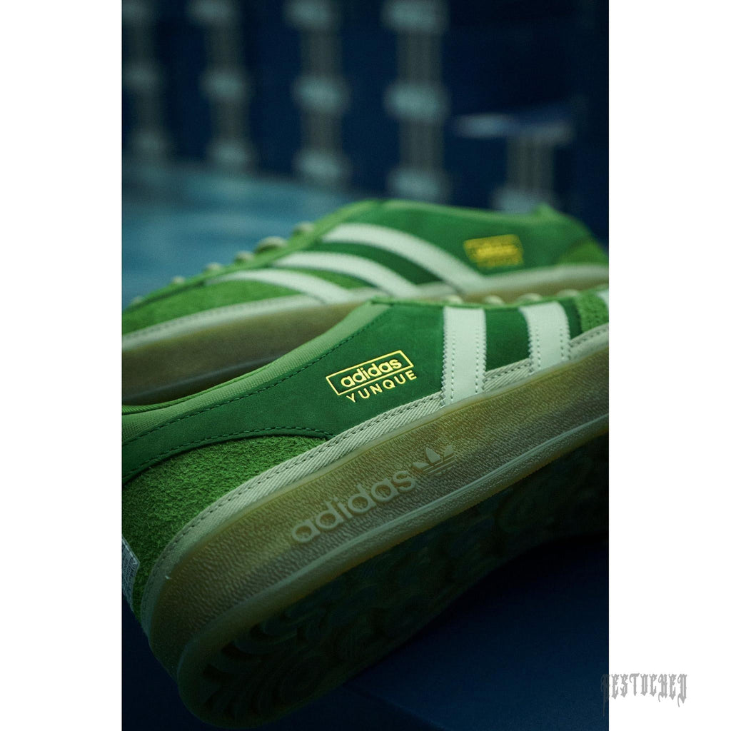 Adidas x Bad Bunny Gazelle Indoor "El Yunque" green suede sneaker with white stripes, gold branding, and gum sole.
