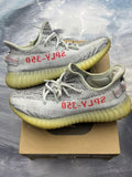 Pre-owned ADIDAS YEEZY 350 V2 Blue Tint sneakers, size 7, with grey knit upper, red "SPLY-350" text, and yellow translucent sole.
