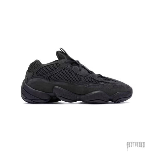 Adidas Yeezy 500 Utility Black sneaker, featuring a sleek all-black mesh and suede design with a chunky sole.