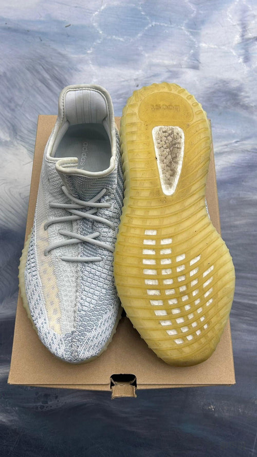 Pre-owned Adidas Yeezy Boost 350 Cloud White size 11.5, knit upper and yellow Boost sole.