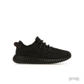 ADIDAS YEEZY BOOST 350 PIRATE BLACK (2023) sneaker with dark Primeknit upper, red stitching, and ribbed sole.