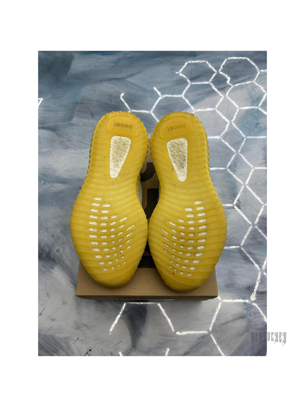 Pre-owned ADIDAS YEEZY BOOST 350 V2 Natural sneakers, size 11, showing yellow ribbed outsoles.