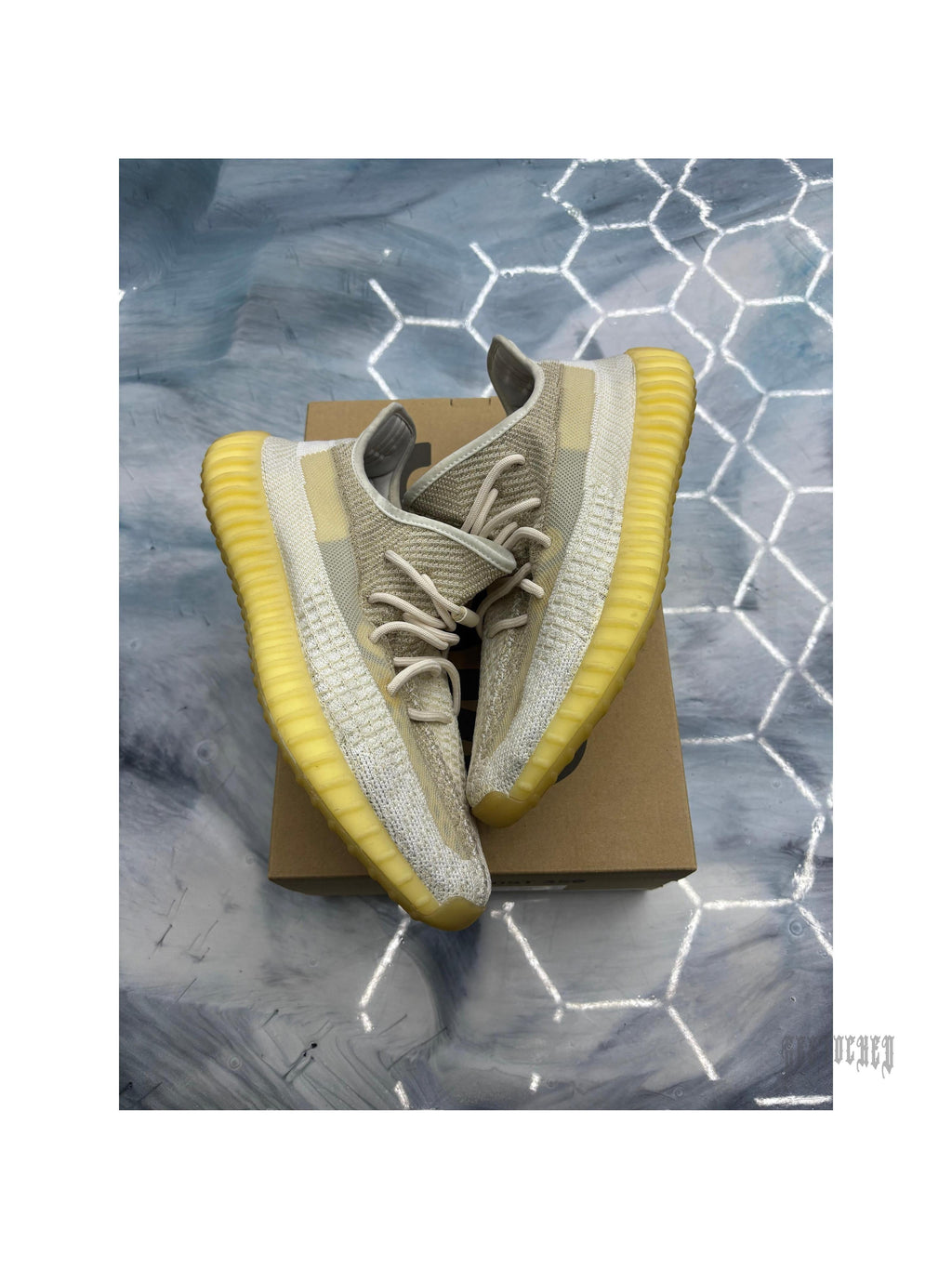Pre-owned ADIDAS YEEZY BOOST 350 V2 Natural sneakers, size 11, with tan knit upper and translucent yellow sole.