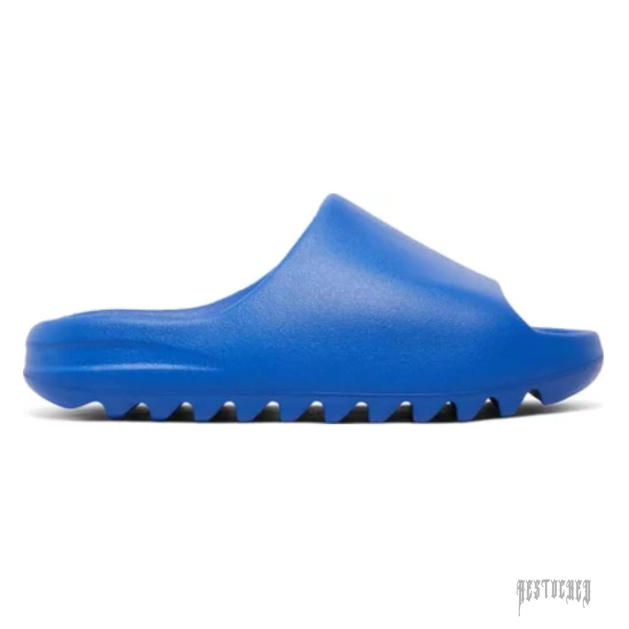 ADIDAS YEEZY SLIDE AZURE: Bright blue foam slide with a wide strap and ridged sole.