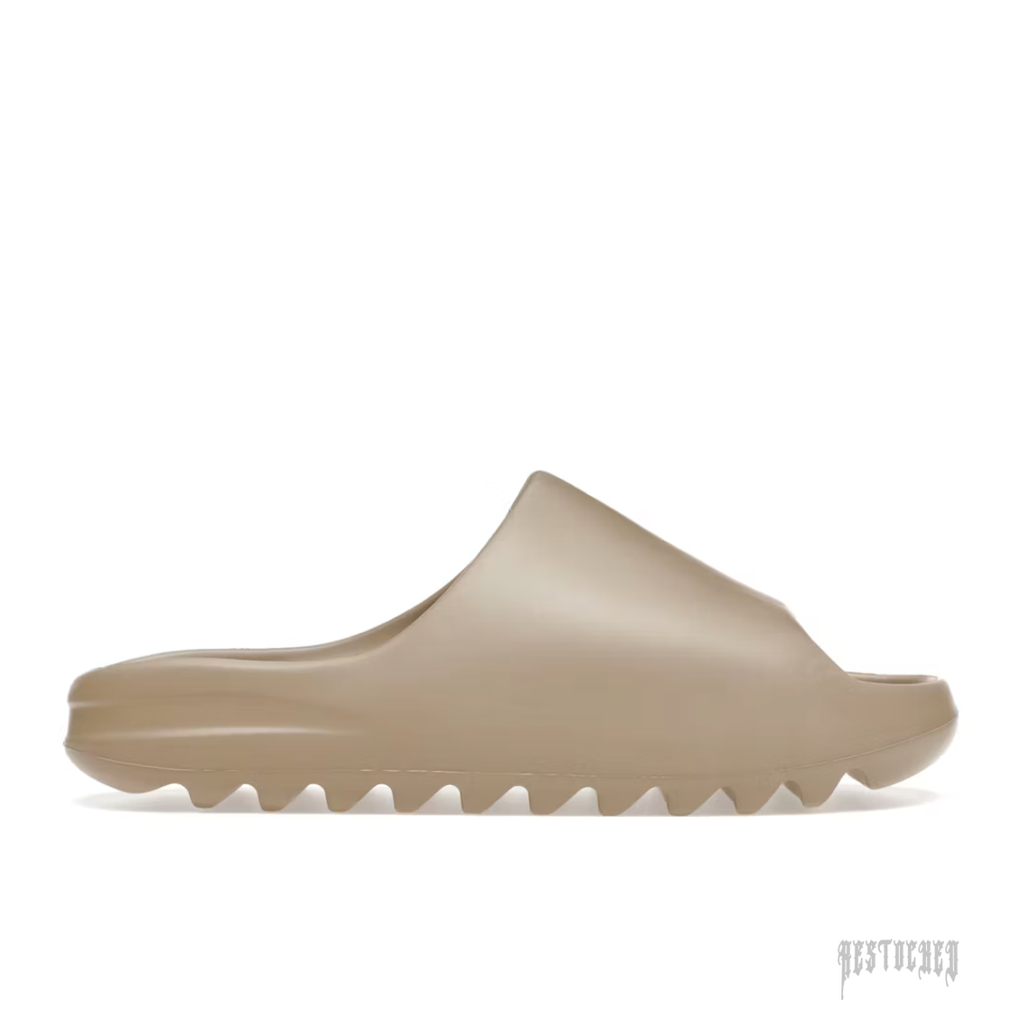 ADIDAS YEEZY SLIDE PURE (FIRST RELEASE) in a solid, matte tan color with a thick, ridged sole.