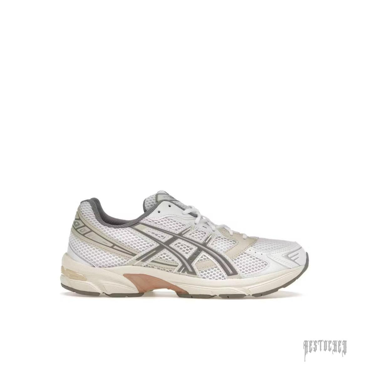 ASICS GEL-1130 sneaker in white mesh with clay grey overlays and dark grey stripes.