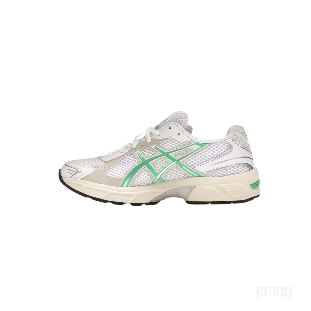 ASICS GEL-1130 women's sneaker with white mesh, Malachite Green accents, and an off-white midsole.