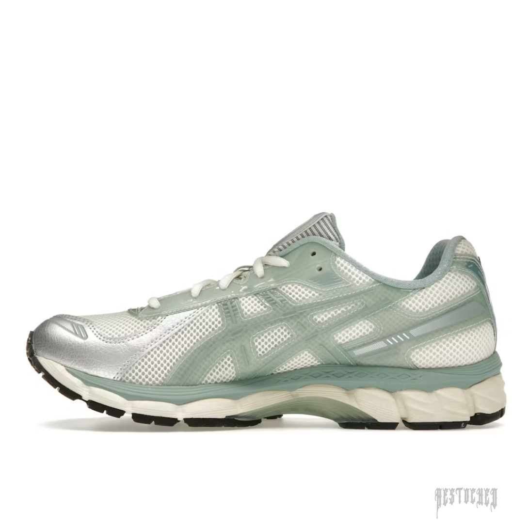 ASICS GEL-KAYANO 12.1 KITH Cream Sage sneaker, white mesh with light green and silver accents.