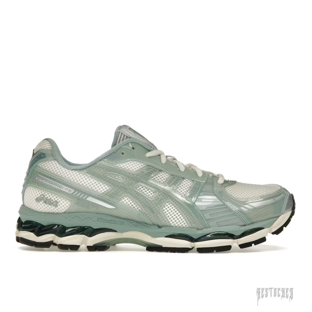 ASICS GEL-KAYANO 12.1 KITH CREAM SAGE sneaker, light green and white mesh with glossy overlays.