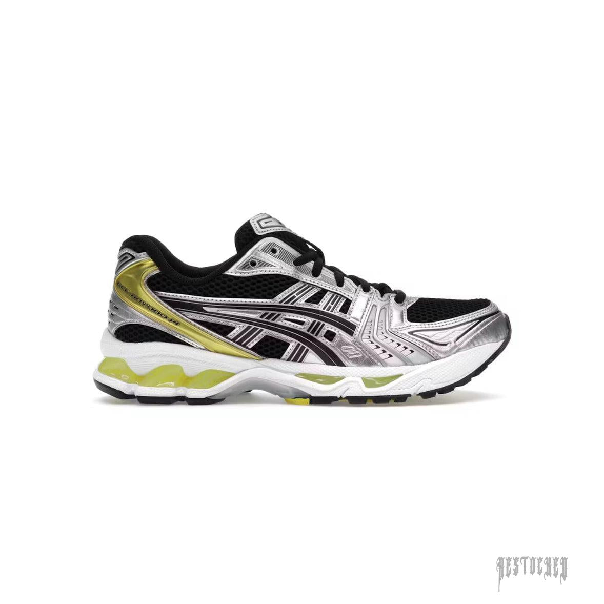 ASICS GEL-KAYANO 14 sneaker in black mesh with metallic silver overlays and lemon spark accents.