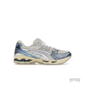 ASICS GEL-KAYANO 14 CREAM METALLIC BLUE sneaker, side view. Cream mesh upper with metallic blue and silver accents.