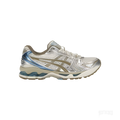 ASICS GEL-KAYANO 14 Cream Pepper women's sneaker with layered mesh, synthetic leather, and blue accents.