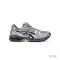 ASICS GEL KAYANO 14 URBAN RESEARCH sneakers in metallic silver and grey mesh with black stripes.
