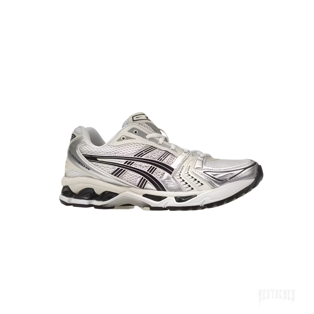 ASICS GEL-KAYANO 14 Women’s running shoe in white mesh with silver overlays and black stripes.