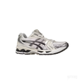 ASICS GEL-KAYANO 14 Women’s running shoe in white mesh with silver overlays and black stripes.