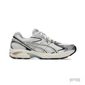 ASICS GT 2160 sneakers in white and cream with black accents and metallic silver details.