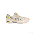 ASICS GT-2160 "Paris" sneaker in cream mesh with black, orange, and neon yellow accents.