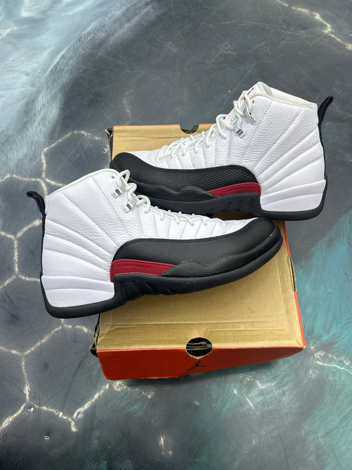JORDAN 12 RETRO TAXI FLIP PRE OWNED SIZE 9.5