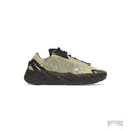 Adidas Yeezy Boost 700 MNVN Resin sneaker with a light green nylon upper, black sole, and reflective silver "700" branding.