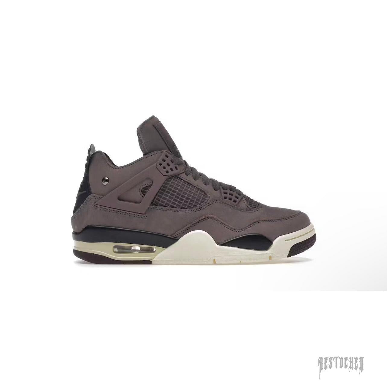 A Ma Maniére x Air Jordan 4 Retro "Violet Ore" sneaker, dark grey suede with black and cream accents.