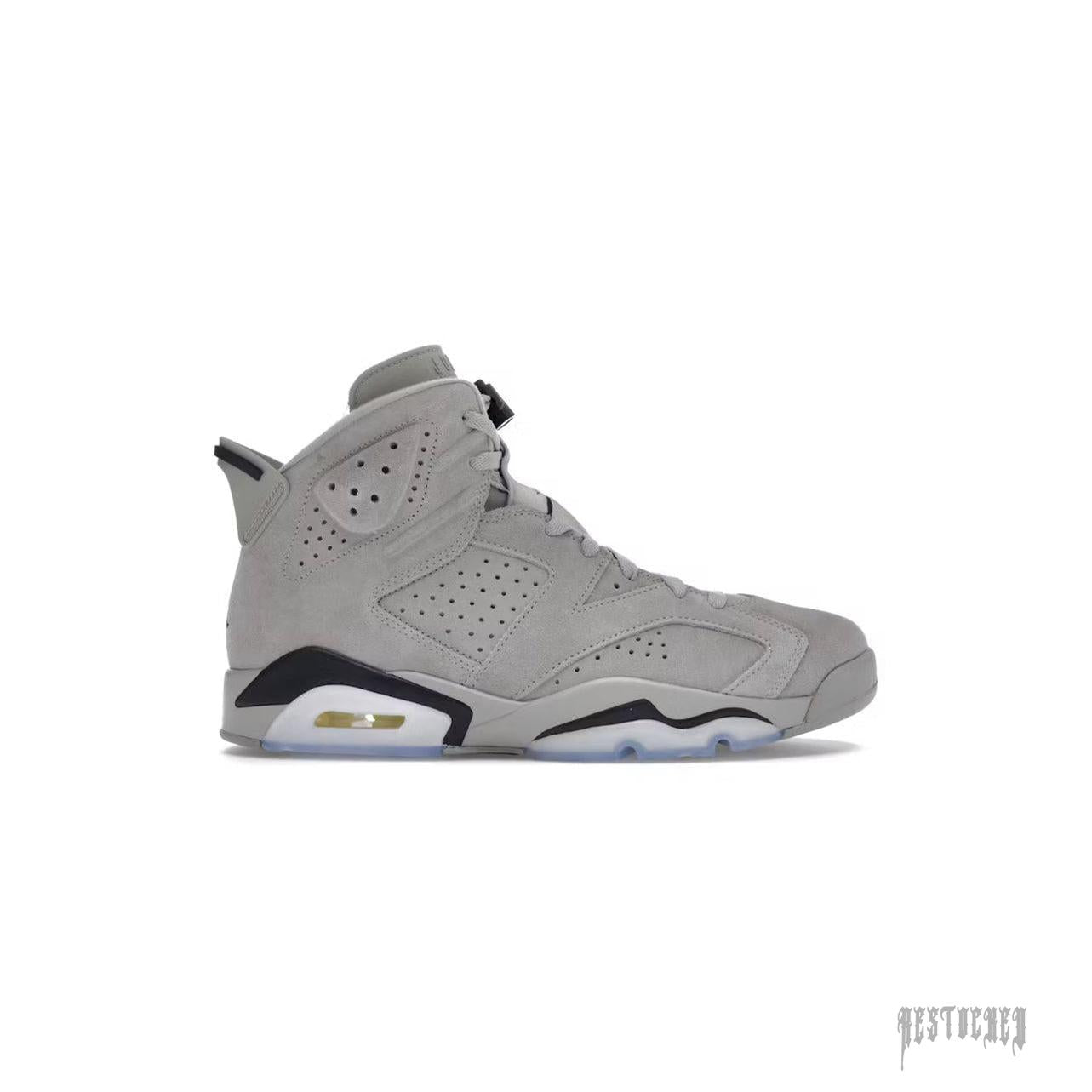 Jordan 6 Retro Georgetown (2022) sneaker in light grey suede with black accents and visible air unit.