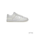 Nike Dunk Low Retro "Coconut Milk" women's sneaker, off-white leather with matching laces and sole.