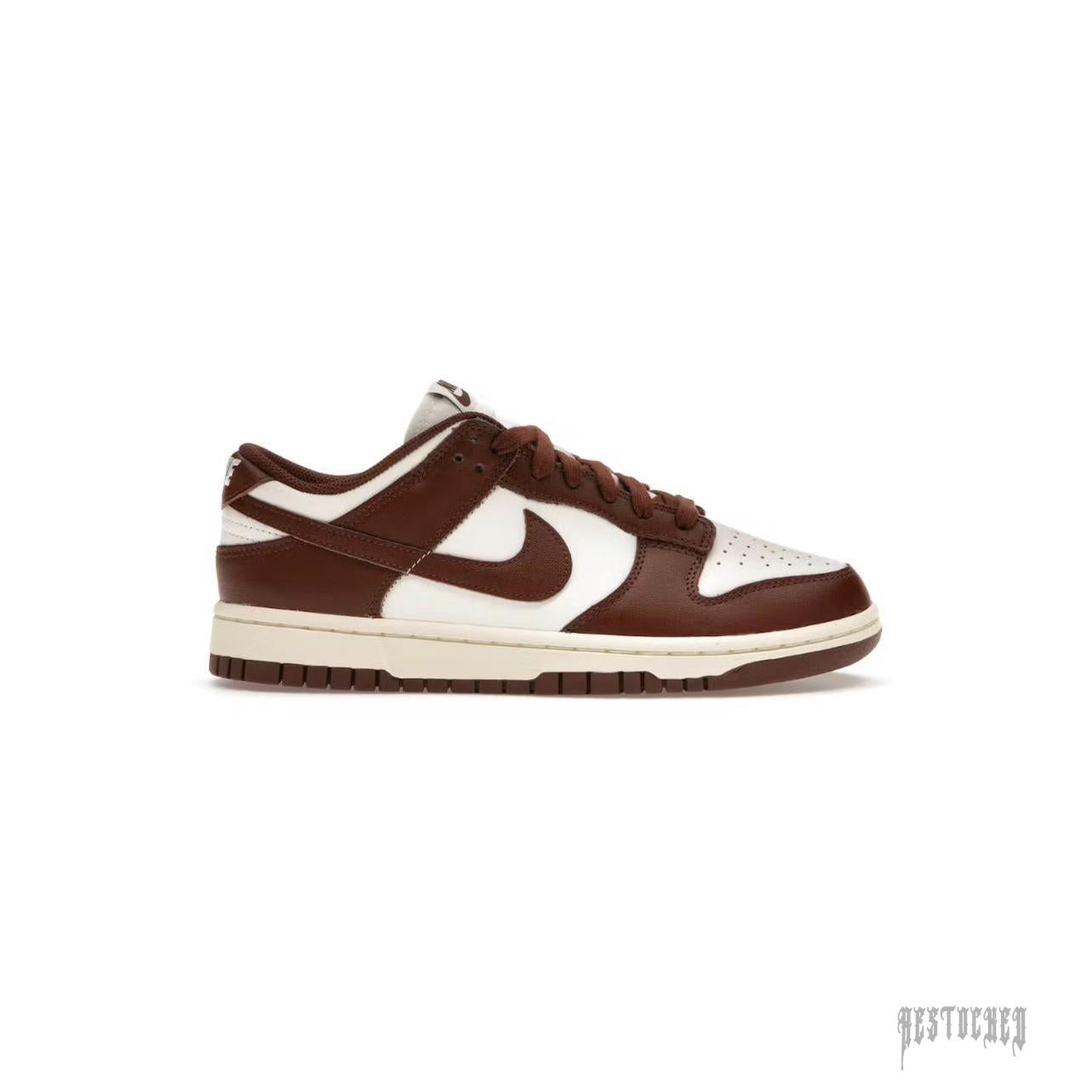 Nike Dunk Low Cacao Wow women's sneaker with "Coconut Milk" leather base, "Cacao Wow" accents, and "Sail" midsole.