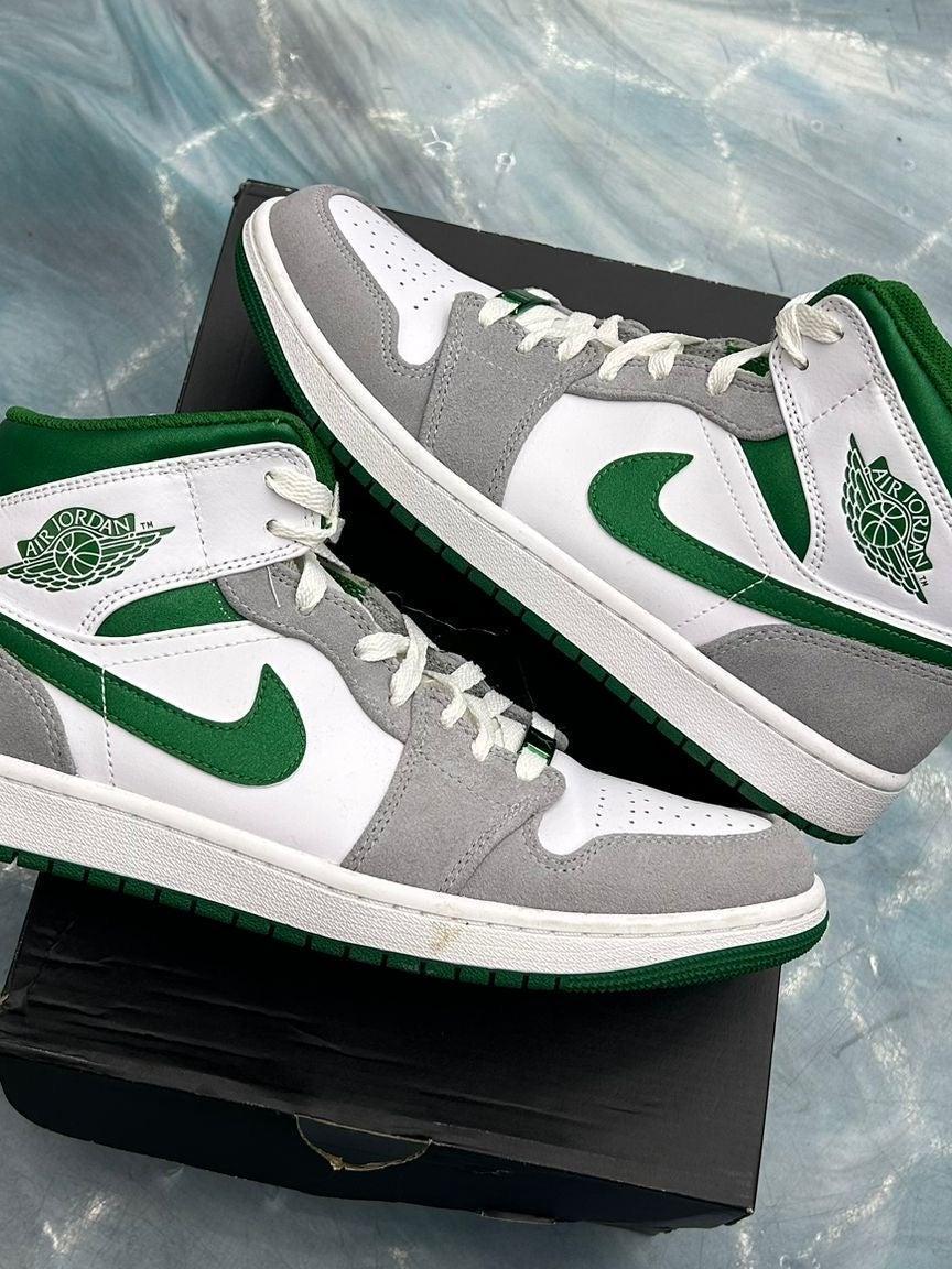 Pre-owned Jordan 1 Mid SE in grey, white, and green leather with white laces, size 9.5.