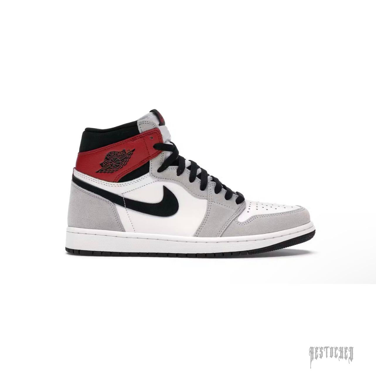 Jordan 1 Retro High Light Smoke Grey sneaker with white leather, grey suede, black swoosh, and red ankle.