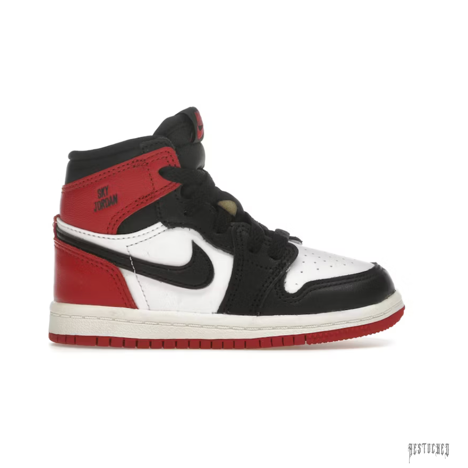 Toddler Jordan 1 Retro High OG Black Toe Reimagined sneaker in red, black, and white leather.