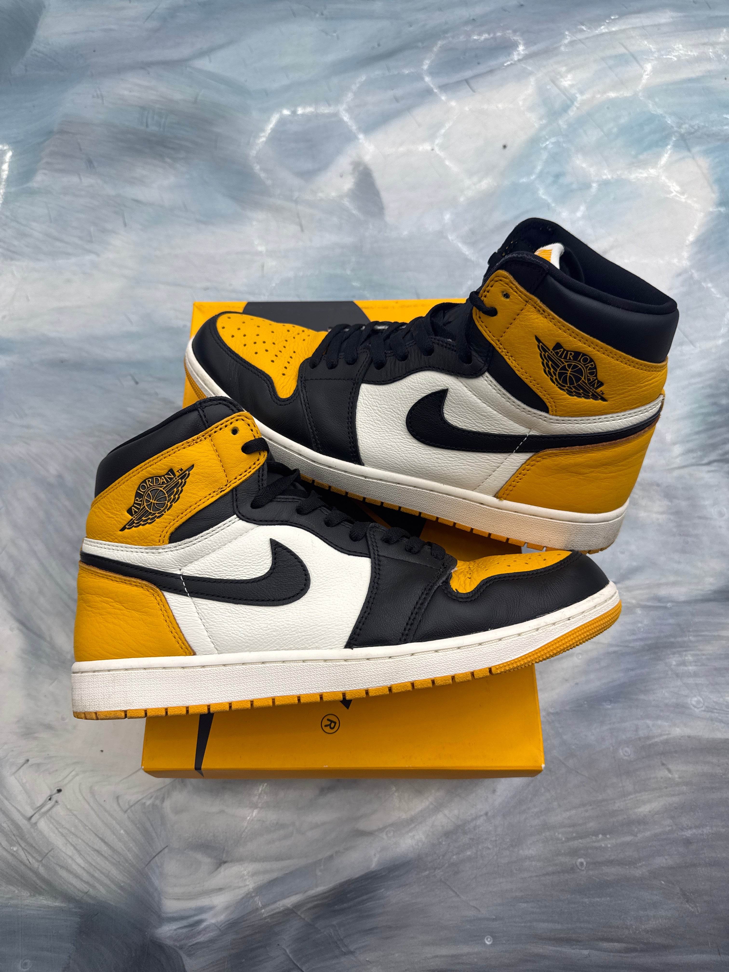 Pre-owned Jordan 1 Retro High OG Taxi sneakers, black, white, and yellow leather, size 12.