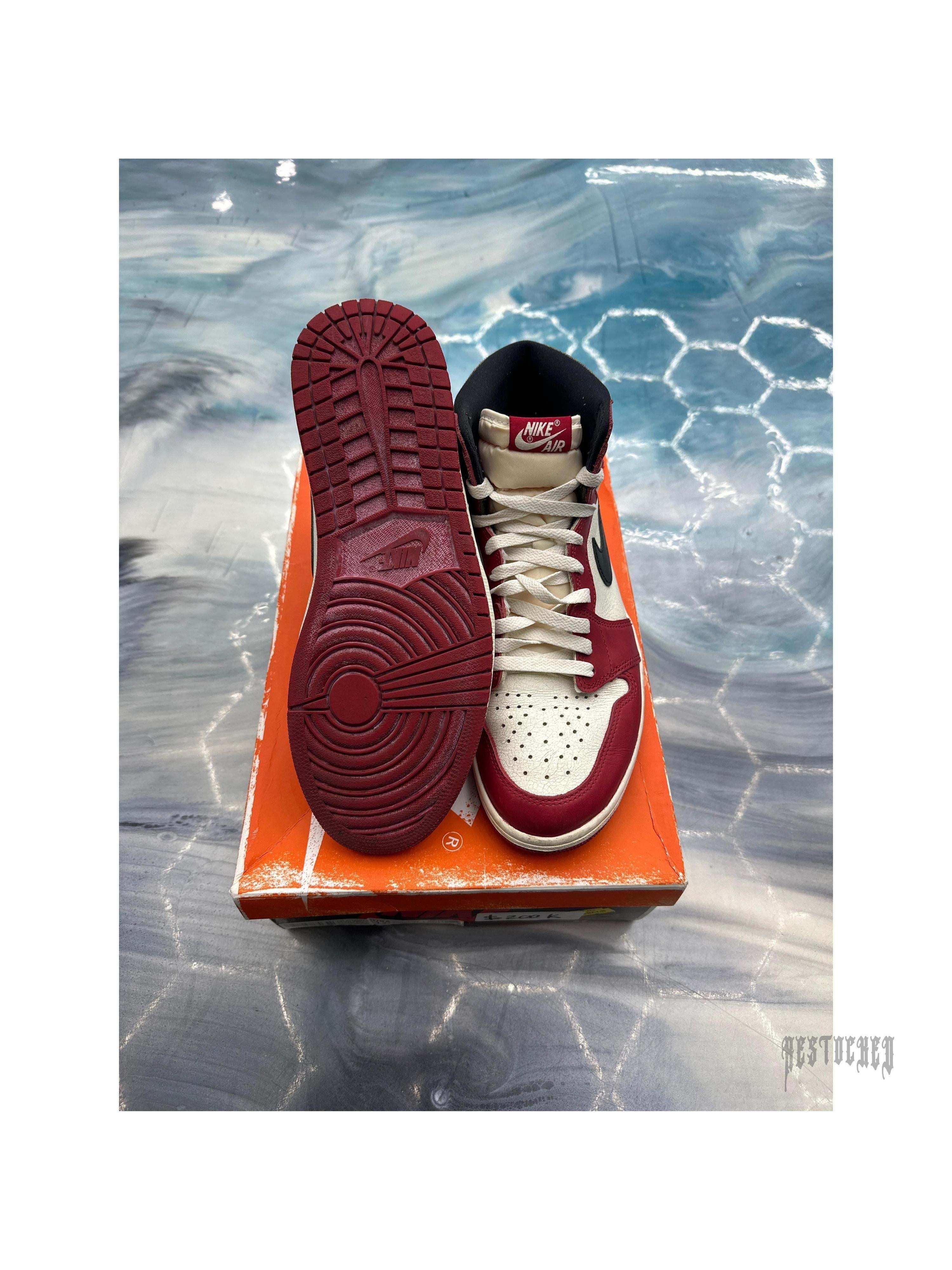Pre-owned Jordan 1 Retro High PG Chicago Lost and Found, size 11, red and white leather, showing sole.