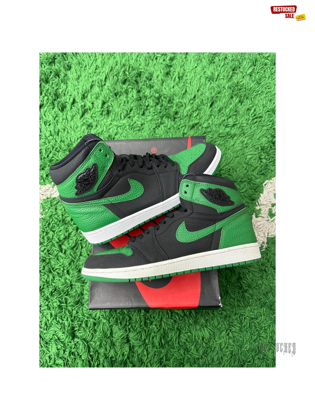 Pre-owned Jordan 1 Retro High Pine Green Black sneakers, size 10.5, on a box and green turf.