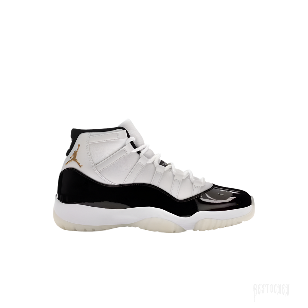 JORDAN 11 RETRO DMP GRATITUDE sneaker, white leather upper with black patent leather mudguard, gold Jumpman logo.