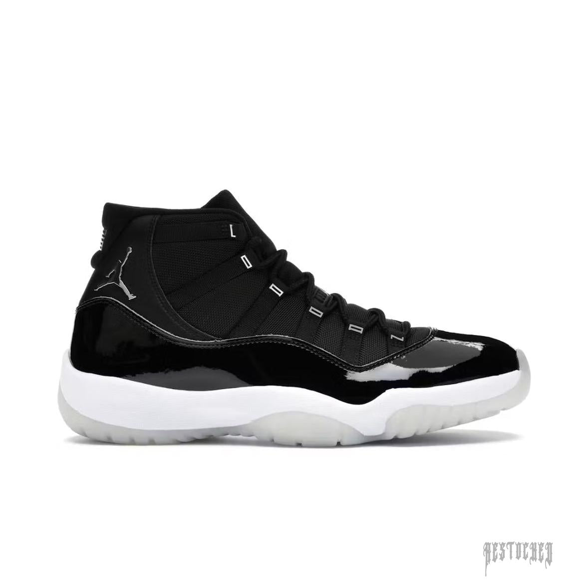 JORDAN 11 Retro Jubilee 25th Anniversary sneaker, black patent leather and mesh with white sole.