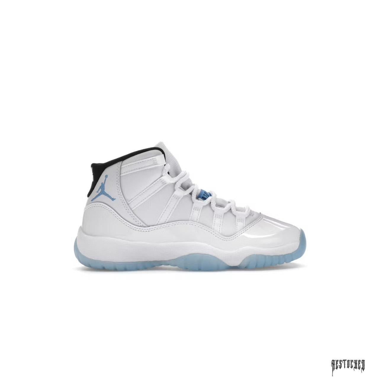 JORDAN 11 Retro Legend Blue (GS) sneaker, white patent leather and mesh upper, light blue accents, icy blue outsole.