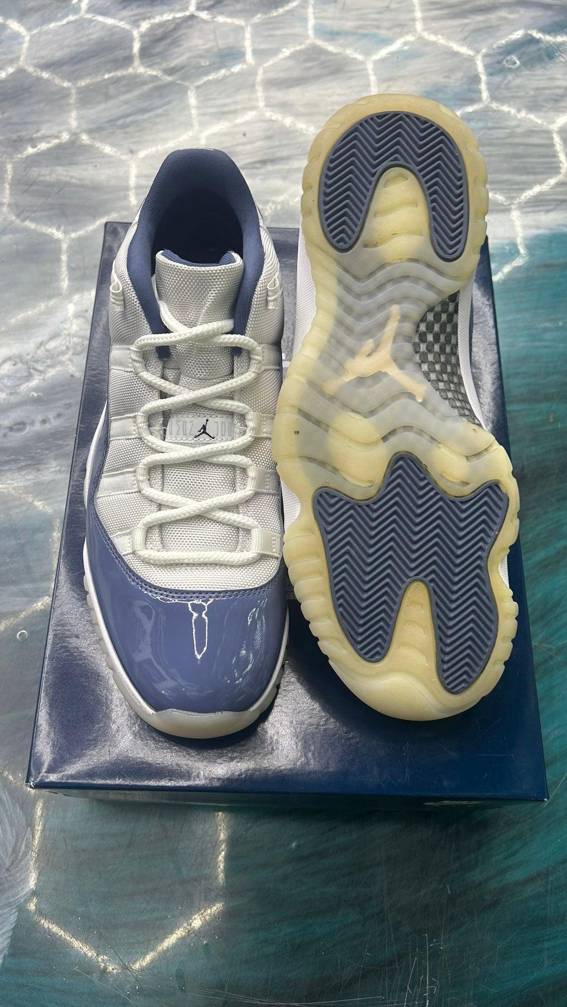 Pre-owned Jordan 11 Retro Low Diffused Blue size 11, light grey upper with blue patent leather and translucent sole.