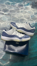 JORDAN 11 Retro Low Diffused Blue pre-owned size 11 sneakers with white mesh and blue patent leather.